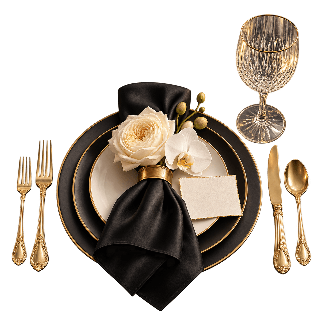 Black and ivory dinner setting with antique-gold flatware and flowers